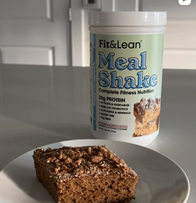 Fit and Lean meal shake on a desk